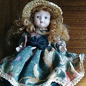 a baby doll with glass